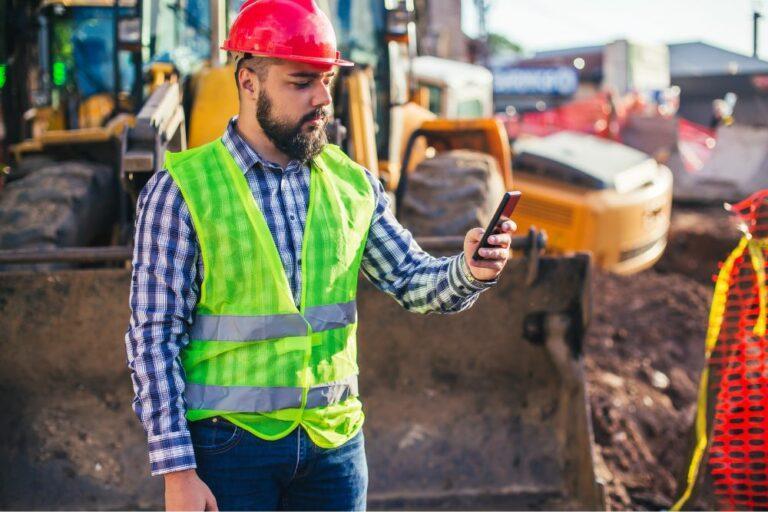 Construction worker ordering construction materials online with GoBuild composable ecommerce for construction