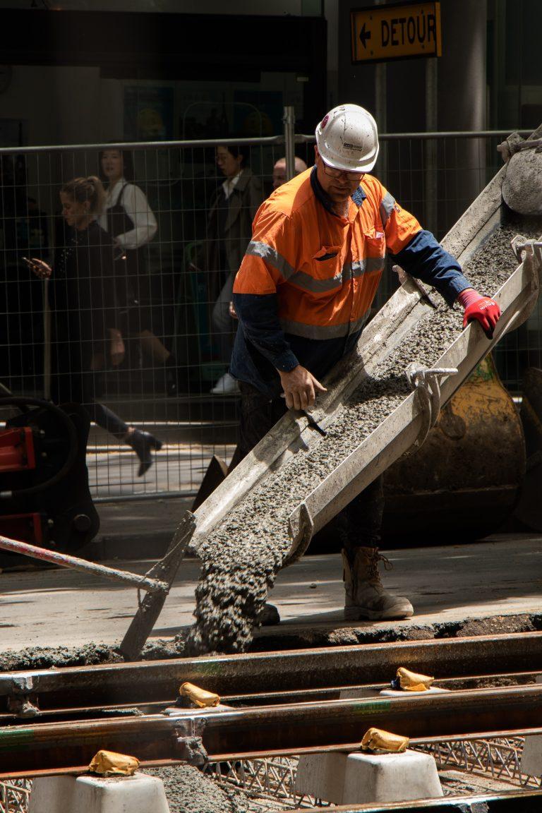 Worker-using-ready-mix-concrete-he-ordered-online